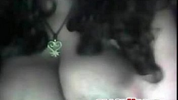 Black babe plays with her huge breasts