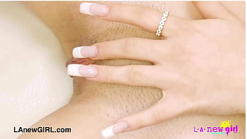 Enchanting brunette beauty naked close up