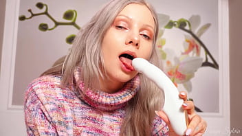 A nymph in a sweater expands her holes by inserting a vibrator blowjob and female orgasm