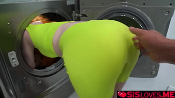 Madi collins inside the washing machine with legs wide open