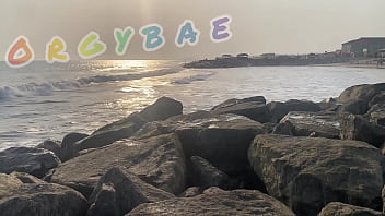 Couple play voyeur at public bar and beach