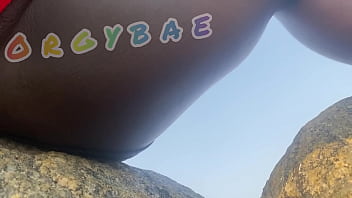 Couple play voyeur at public bar and beach