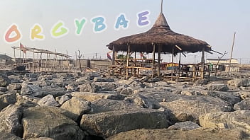 Couple play voyeur at public bar and beach