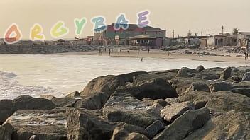 Couple play voyeur at public bar and beach