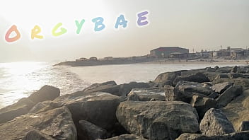 Couple play voyeur at public bar and beach