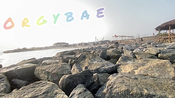 Couple play voyeur at public bar and beach