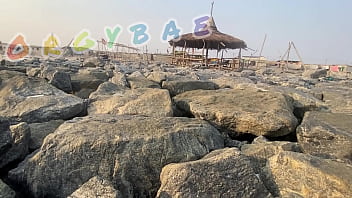 Couple play voyeur at public bar and beach