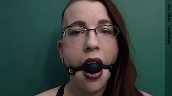 Dark lipstick ballgag drooling with intense eye contact