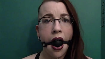 Dark lipstick ballgag drooling with intense eye contact
