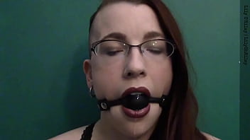 Dark lipstick ballgag drooling with intense eye contact