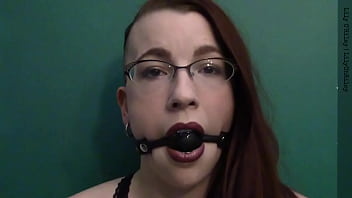 Dark lipstick ballgag drooling with intense eye contact