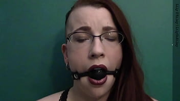 Dark lipstick ballgag drooling with intense eye contact