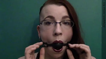 Dark lipstick ballgag drooling with intense eye contact