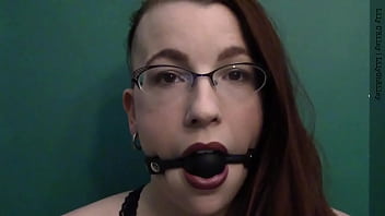 Dark lipstick ballgag drooling with intense eye contact