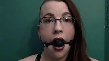 Dark lipstick ballgag drooling with intense eye contact
