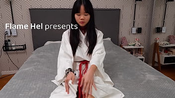 Baebi hel opens legs wide trying on leather bondage gear