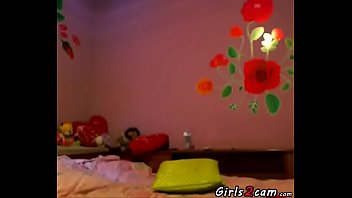 Brunette girl puts a dildo in the ass and pussy