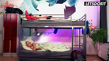 Cute young backpacker surprising hotel guest letsdoeit