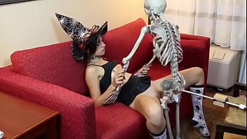 Cute witch and skeleton get it on