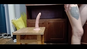 Wet tight pussy rides dildo