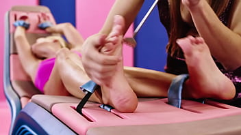 Beautiful blonde model candee licious gets the giggles feet tickling challenge with talia mint