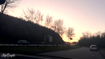 One hand on the steering wheel one hand on the cock risky public p