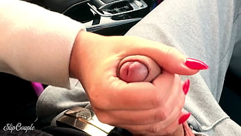 One hand on the steering wheel one hand on the cock risky public p
