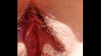 Sexy mature shows her hairy spread eagle cunt