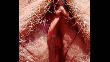 Sexy mature shows her hairy spread eagle cunt