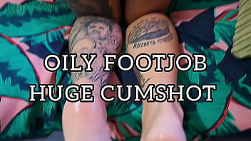 Oily footjob with huge cumshot