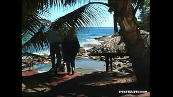 Blonde suzan gets fucked by two men while playing in the ocean