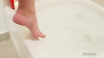 Sara jay plays with wax & her pussy during a bubble bath in jacuzzi