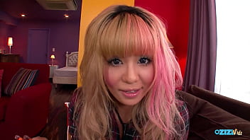A perspective in which a tan asian gyaru playfully engages with you