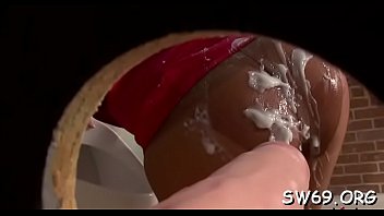 Sexy babe gets covered in it