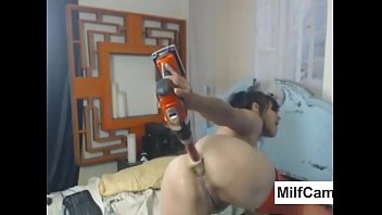 Brunette babe fucked herself with huge toys