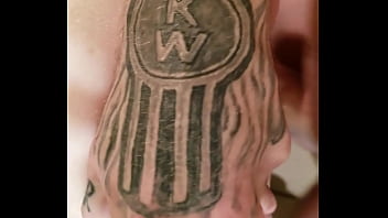 Bent over the kitchen counter