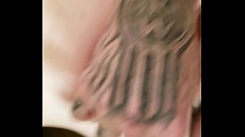 Bent over the kitchen counter