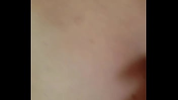 Bent over the kitchen counter