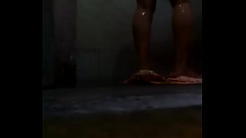 Lady taking off her clothes to take bath