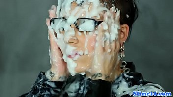 Classy spex babe masturbating at gloryhole