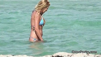 Foursome party in a tent at the public beach