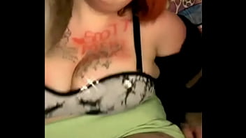 Mature busty with tattoos on her tits dances weird