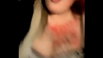 Mature busty with tattoos on her tits dances weird