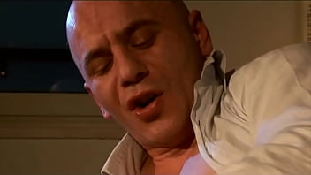 The commissioner gets his cock sucked by his colleague then fucks her on the desk