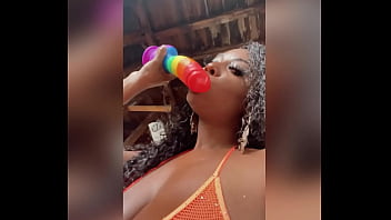 Slobbering on a huge thick dildo