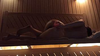 Girl with a perfect figure is pleasuring in the sauna with a pink dildo squirting from fucking