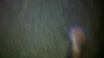 Naked oiled feets in the nature