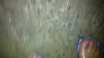 Naked oiled feets in the nature