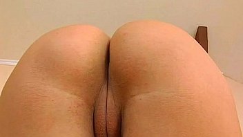 Brunette slut playing with shaved pussy