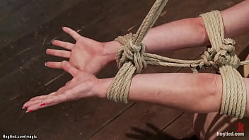 Bent Redhead Lesbian Slave Jessi Palmer With Ankles Tied To Spreader Bar And Hands Tied Together Behind Gets Anal Hooked Then Takes Back Arch Suspension With Ankles And Wrists Tied To The Ground thumbnail
